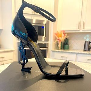 Worn once to an event. Receipt attached. I wear an 8 but you have size up in YSL